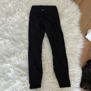 black lululemon leggings size 4 - well worn - slight piling